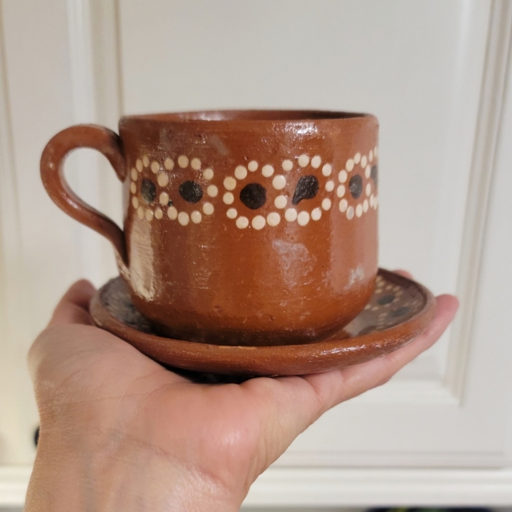 Set of 2 clay cups with plates